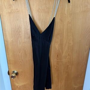 H&M 100% Viscose Black coctail dress with sparkly spaghetti straps. Size XS.